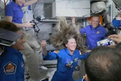 In this image from video made available by NASA, Russian Cosmonaut Anna Kikina enters the International Space Station from a SpaceX Crew Dragon capsule on Thursday, Oct. 6, 2022. Kikina is the first Russian to launch from the U.S., in 20 years.