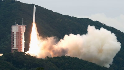 The Epsilon-6 rocket blasts off from the Uchinoura Space Center in Kimotsuki town, Kagoshima prefecture, southern Japan Wednesday, Oct. 12, 2022.