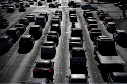 Cars wait at a red light during rush hour on the Las Vegas Strip in Las Vegas, April 22, 2021.