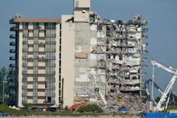 Coast Guard boats patrol in front of the partially collapsed Champlain Towers South condo building in Surfside, Fla on July 1, 2021.