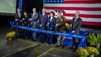 From Left, Mike Preston, Arkansas Commerce Secretary; Jen McManus, Vice President Of Production Operations, Lockheed Martin; Scott Greene, Executive Vice President, Missiles and Fire Control, Lockheed Martin; Arkansas Governor Asa Hutchinson; Brenda Davidson, Vice President Of PAC-3 Programs, Lockheed Martin; Brigadier General Frank J. Lozano, Program Executive Officer, Missiles and Space; and Aaron Huckaby, Camden Site Director, Lockheed Martin.