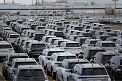 New vehicles are shown parked in storage lots near the the Stellantis Detroit Assembly Complex in Detroit, Wednesday, Oct. 5, 2022.