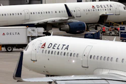 A Delta Air Lines plane leaves the gate on July 12, 2021, at Logan International Airport in Boston.