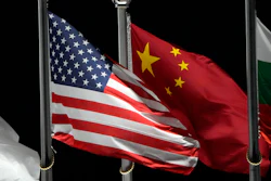 The American and Chinese flags wave at Genting Snow Park ahead of the 2022 Winter Olympics on Feb. 2, 2022, in Zhangjiakou, China.