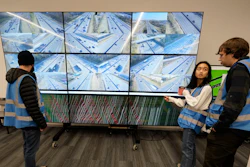 Researchers look at live interstate traffic images and data screens Nov. 17, 2022, in Nashville, Tenn.