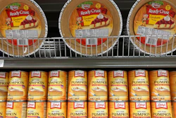 Canned pumpkin and graham cracker shell crusts are displayed at a Publix Supermarket, Tuesday, Nov. 16, 2021 in North Miami, Fla. Americans are bracing for a costly Thanksgiving this year, with double-digit percent increases in the price of turkey, potatoes, stuffing, canned pumpkin and other staples.