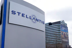 In this Tuesday, May 6, 2014, file photo, a vehicle moves past a sign outside Fiat Chrysler Automobiles world headquarters in Auburn Hills, Mich. The European Union’s top court has overturned a decision, Tuesday, Nov. 8, 2022, requiring automaker Fiat Chrysler to pay up to 30 million euros ($30 million) in back taxes to Luxembourg. The European Commission, the EU’s anti-trust regulator, had determined in 2015 that a Luxembourg tax ruling favored Fiat companies in Europe and was incompatible with state aid rules in the 27-nation bloc.