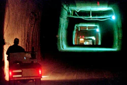 A worker drives a cart through a tunnel inside the Waste Isolation Pilot Plant No. 2, 150-feet below the surface near Carlsbad, N.M., on April 8, 1998.
