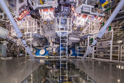 This undated image provided by the National Ignition Facility at the Lawrence Livermore National Laboratory shows the NIF Target Bay in Livermore, Calif. The system uses 192 laser beams converging at the center of this giant sphere to make a tiny hydrogen fuel pellet implode.