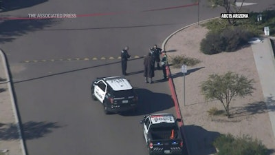 Law enforcement outside an Amazon delivery hub in Chandler, Ariz., Dec. 14, 2022.