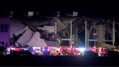 An Amazon distribution center is heavily damaged after a strong thunderstorm moved through the area, Dec. 10, 2021, in Edwardsville, Ill.