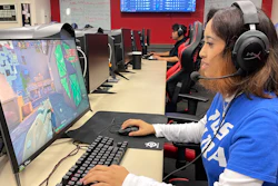 Lethrese Rosete, a 20-year-old DePaul sophomore who is majoring in UX design to combine her creativity and coding skills, plays an online game at the university's Esports Gaming Center Thursday, Sept. 22, 2022, in Chicago. A growing effort to channel students' enthusiasm for esports toward preparing them for jobs in science, technology, engineering and math could improve racial diversity in STEM.