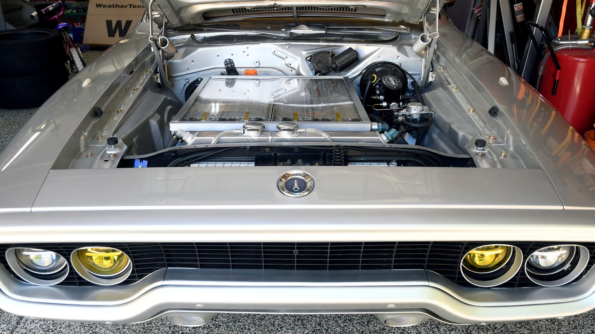 Racers, Mechanics, Tinkerers Converting Classic Cars to EVs - Vimarsana News
