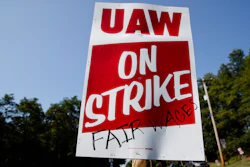 A sign is posted during a demonstration outside a General Motors facility in Langhorne, Pa., on Sept. 23, 2019.