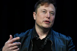 Tesla and SpaceX Chief Executive Officer Elon Musk speaks at the SATELLITE Conference and Exhibition on March 9, 2020, in Washington. Lawyers for Tesla shareholders suing Musk over a misleading tweet are urging a federal judge to reject the billionaire's request to move an upcoming trial to Texas from California.