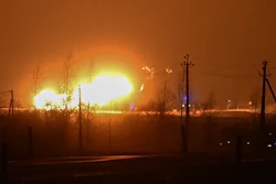 A flame rises after an explosion at a gas pipeline near Pasvalys, 175 km (109 miles) north of Vilnius in northern Lithuania on Friday, Jan. 13, 2023.