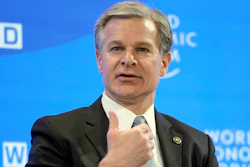 FBI Director Christopher Wray talks at the World Economic Forum in Davos, Switzerland Thursday, Jan. 19, 2023.