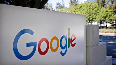 In this Oct. 20, 2015 file photo is signage outside Google headquarters in Mountain View, Calif.