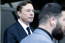 Elon Musk leave the Phillip Burton Federal Building and United States Court House in San Francisco, Tuesday, Jan. 24, 2023.