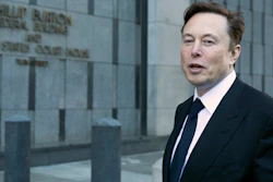 Elon Musk leaves the Phillip Burton Federal Building and United States Court House in San Francisco, Tuesday, Jan. 24, 2023. Musk returned to federal court to defend himself against a class-action lawsuit that alleges he misled Tesla shareholders with a tweet about an aborted buyout that the billionaire defiantly insisted Tuesday he could have pulled off, had he wanted.
