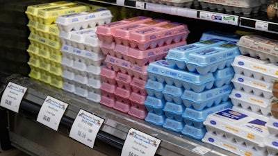 Cartons of eggs on display at HarvesTime Foods, Chicago, Jan. 5, 2023.