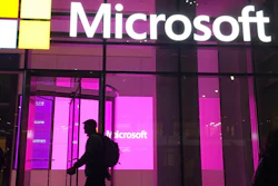 People walk past a Microsoft office in New York, Nov. 10, 2016.