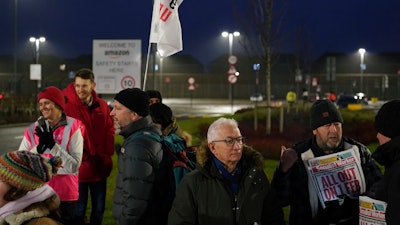Members of the GMB union on the picket line outside the Amazon fulfillment centre, Coventry, England, Jan. 25, 2023.