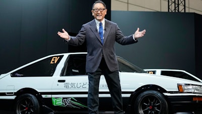 Toyota Motor Corp. Chief Executive Akio Toyoda delivers a speech on the stage at the Tokyo Auto Salon, an industry event similar to the world's auto shows on Jan. 13, 2023, in Chiba near Tokyo.