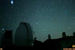 This image taken from video provided by the NAOJ & Asahi Shimbun, shows spiral swirling through the night sky from Mauna Kea, Hawaii's tallest mountain.