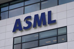 The logo of ASML, a leading maker of semiconductor production equipment, hangs on the head office in Veldhoven, Netherlands, Monday, Jan. 30, 2023.