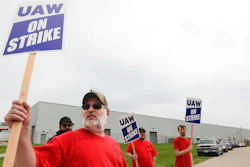 Members of United Auto Workers Local 807 picket after going on strike, May 2, 2022, at a CNH plant in Burlington, Iowa. More than 1,000 striking CNH Industrial workers in Iowa and Wisconsin will soon vote on an offer from the maker of construction and agricultural equipment for the first time since they walked off the job eight months ago. The UAW union said it would schedule a vote on the company’s latest upgraded offer but it did not release any details of what is included in the offer.