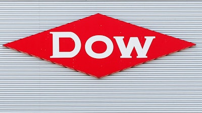 This Aug. 2, 2019, photo shows the Dow corporate logo in Midland, Mich. Dow is cutting about 2,000 jobs, or approximately 5% of its global workforce, Thursday, Jan. 26, 2023, as part of an effort to reach $1 billion in cost savings this year.
