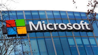 The Microsoft logo is pictured outside the headquarters in Paris, Jan. 8, 2021. A group of video game testers is forming Microsoft's first labor union in the U.S. and the largest in the video game industry. Communications Workers of America said Tuesday, Jan. 3, 2023, that about 300 quality assurance workers at Microsoft video game subsidiary ZeniMax Studios have voted to join the union.