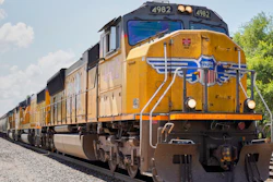 A Union Pacific train travels through Union, Neb., on July 31, 2018. Federal regulators have ordered Union Pacific to make sure a California company gets the grain it needs to prevent millions of chickens from starving while it works to recover from the recent bitter cold and snow. This is the second time in the past year regulators issued an emergency order related to delivery problems at Foster Farms as the railroad struggled with a shortage of crews.