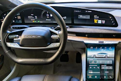 This photo provided by Edmunds shows the interior of the 2022 Lucid Air, an electric vehicle whose software allows it to add features via over-the-air updates.
