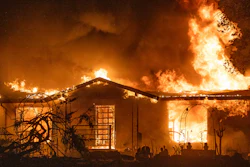 A house burns on Platina Road at the Zogg Fire near Ono, Calif., on Sept. 27, 2020.