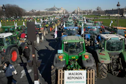 Tractors park in front of the Grand Palais museum on the Esplanade des Invalides, Paris, Feb. 8, 2023.