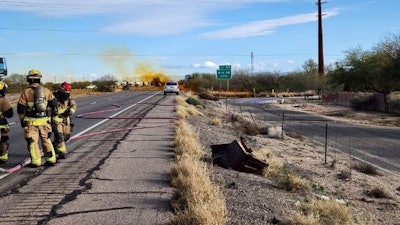 This image provided by the Arizona Department of Public Safety shows what the department says was an accident involving a commercial tanker truck that caused a hazardous material to leak onto Interstate 10 outside Tucson, Ariz., on Tuesday, Feb. 14, 2023, prompting state troopers to shut down traffic on the freeway.