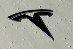 This Oct. 18, 2019, photo shows a Tesla logo in Salt Lake City.