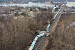 An emergency crew works at the site of a Norfolk Southern train derailment in Van Buren Township, Mich., Feb. 16, 2023.