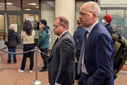 Former Theranos executive Ramesh 'Sunny' Balwani, center, walkes to federal court with his attorney Mark Davies, Friday, Feb. 17, 2023 in San Jose, Calif.