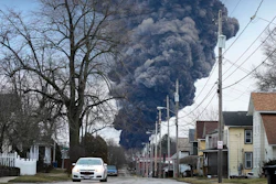 A black plume rises over East Palestine, Ohio, after a controlled detonation of derailed Norfolk Southern trains, Feb. 6, 2023.