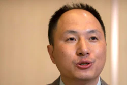 Chinese scientist He Jiankui speaks at a brief press conference in Beijing, Tuesday, Feb. 21, 2023.