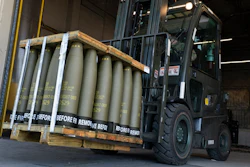 Airmen with the 436th Aerial Port Squadron use a forklift to move 155 mm shells ultimately bound for Ukraine, April 29, 2022, at Dover Air Force Base, Del.