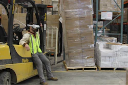 A worker wearing a new real-time impairment screening device for cannabis and other drugs designed by Gaize.