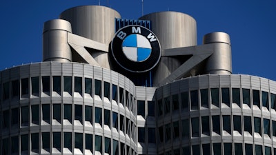 The logo of German car manufacturer BMW is fixed at the headquarters in Munich, Germany, May 14, 2021.