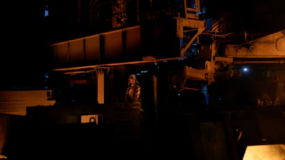 Mark Vidernikov, 30, stands inside a blast furnace at the Zaporizhstal steel plant, in Zaporizhia, Ukraine, Wednesday, March 1, 2023.