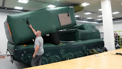 An inflatable decoy of High Mobility Artillery Rocket System (HIMARS) is presented to media in Decin, Czech Republic, Monday, March 6, 2023.