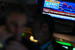 The Federal Reserve interest rate announcement displayed on the floor of the New York Stock Exchange, Feb. 1, 2023.