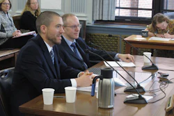 Dan Stickel, chief economist with the Alaska Department of Revenue's tax division, left at table, speaks to the Senate Finance Committee as part of a presentation on the major North Slope oil project known as the Willow project on Thursday, March 23, 2023, in Juneau, Alaska. Seated next to Stickel is Owen Stephens with the tax division.